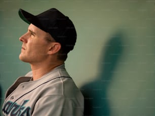 a close up of a baseball player in a uniform