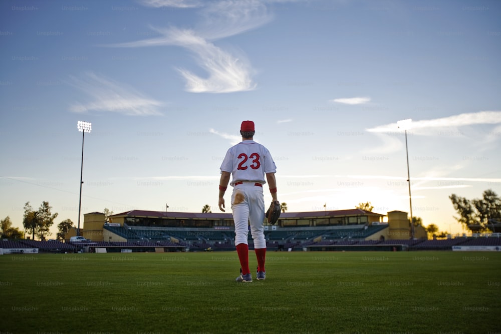 a baseball player is standing on the field