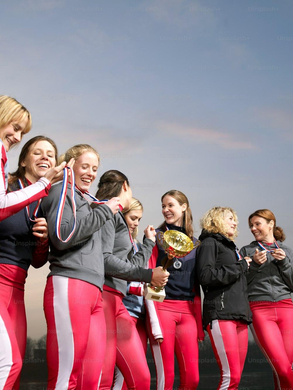 a group of women standing next to each other