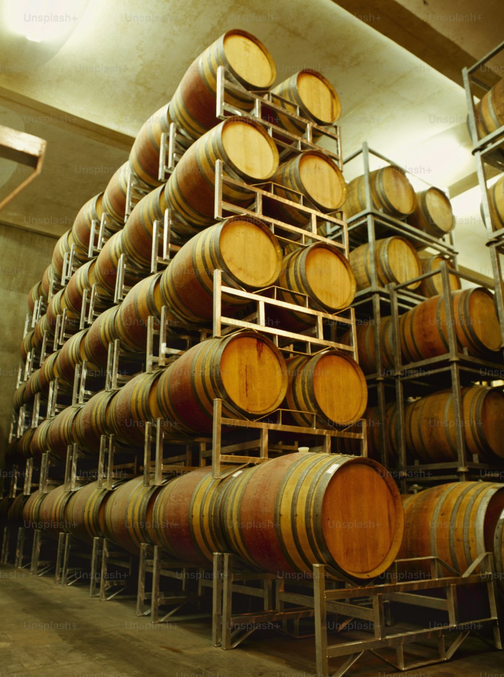 a bunch of barrels stacked on top of each other