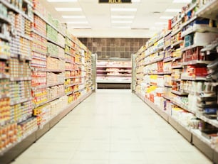 a grocery store aisle filled with lots of food