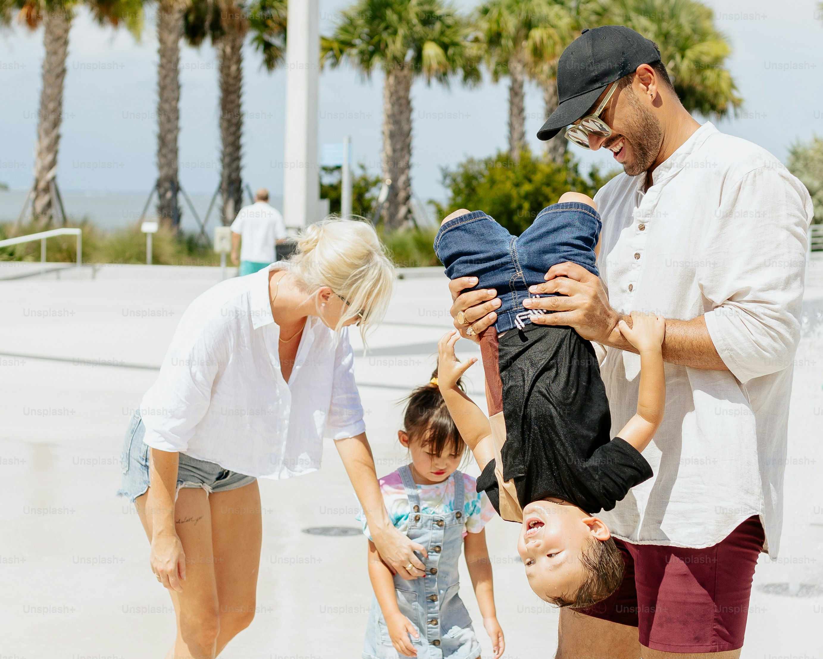 a group of people standing around each other