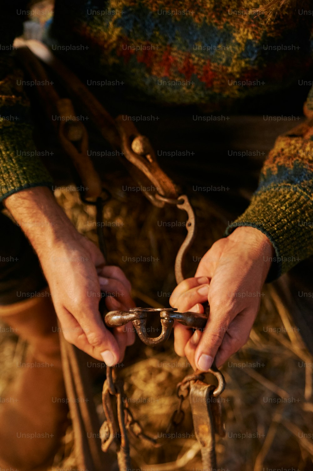 a person holding a pair of scissors in their hands