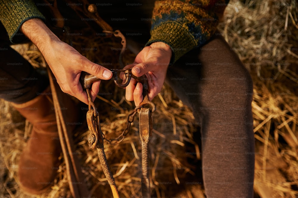 a person holding a pair of scissors in their hands