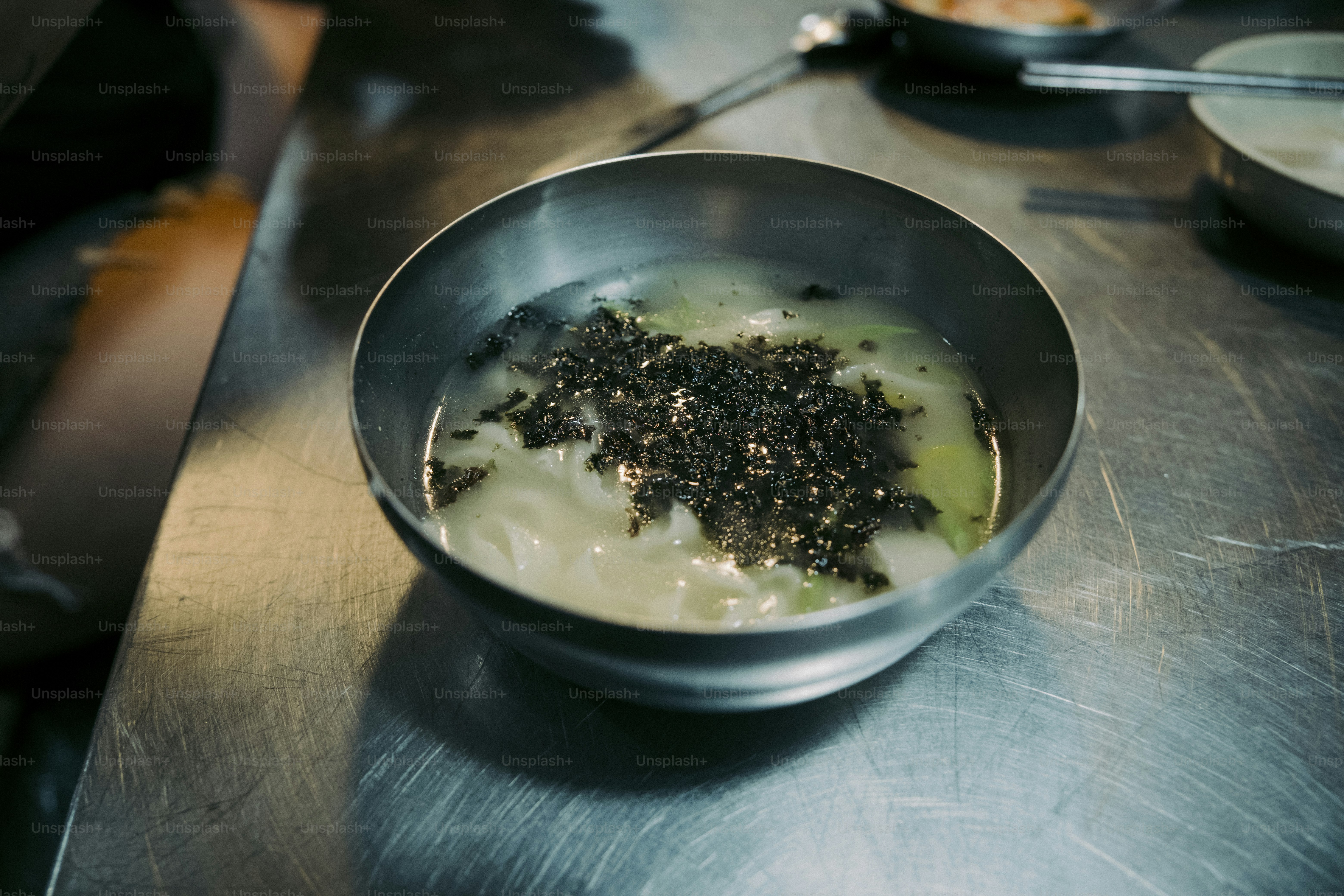 a bowl of yogurt with a spoon in it