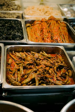 a variety of foods are displayed in trays