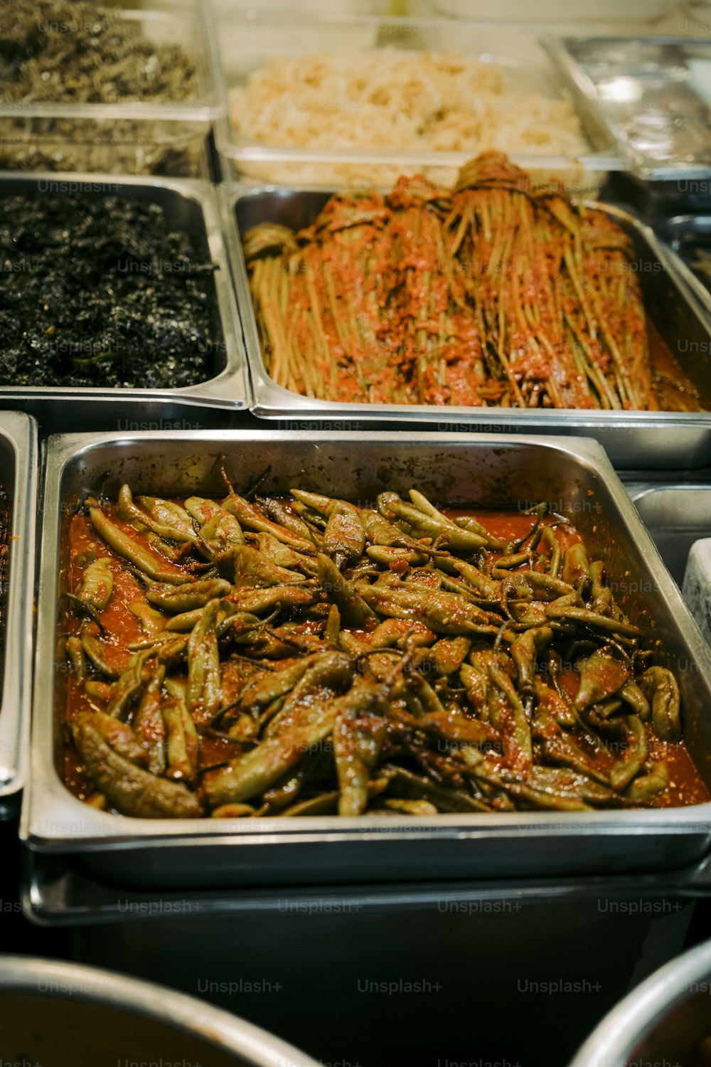 a variety of foods are displayed in trays