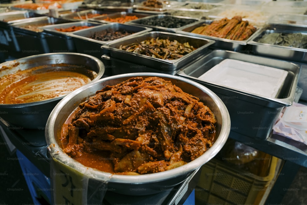 a variety of dishes of food on a table