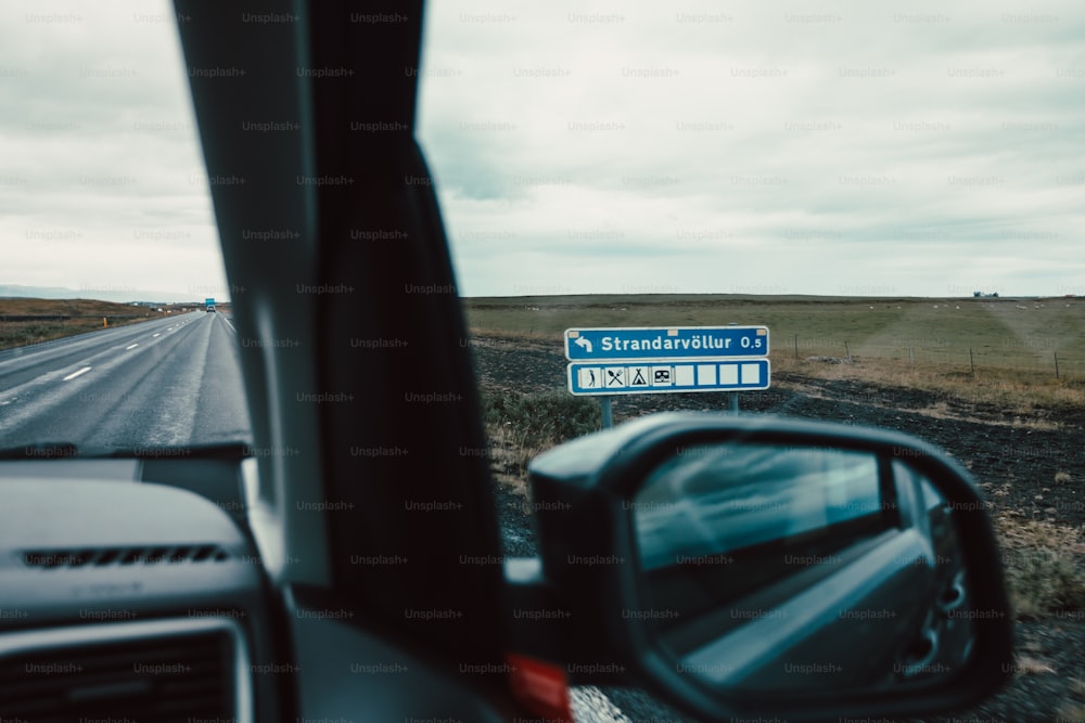 a road with a sign on the side of it