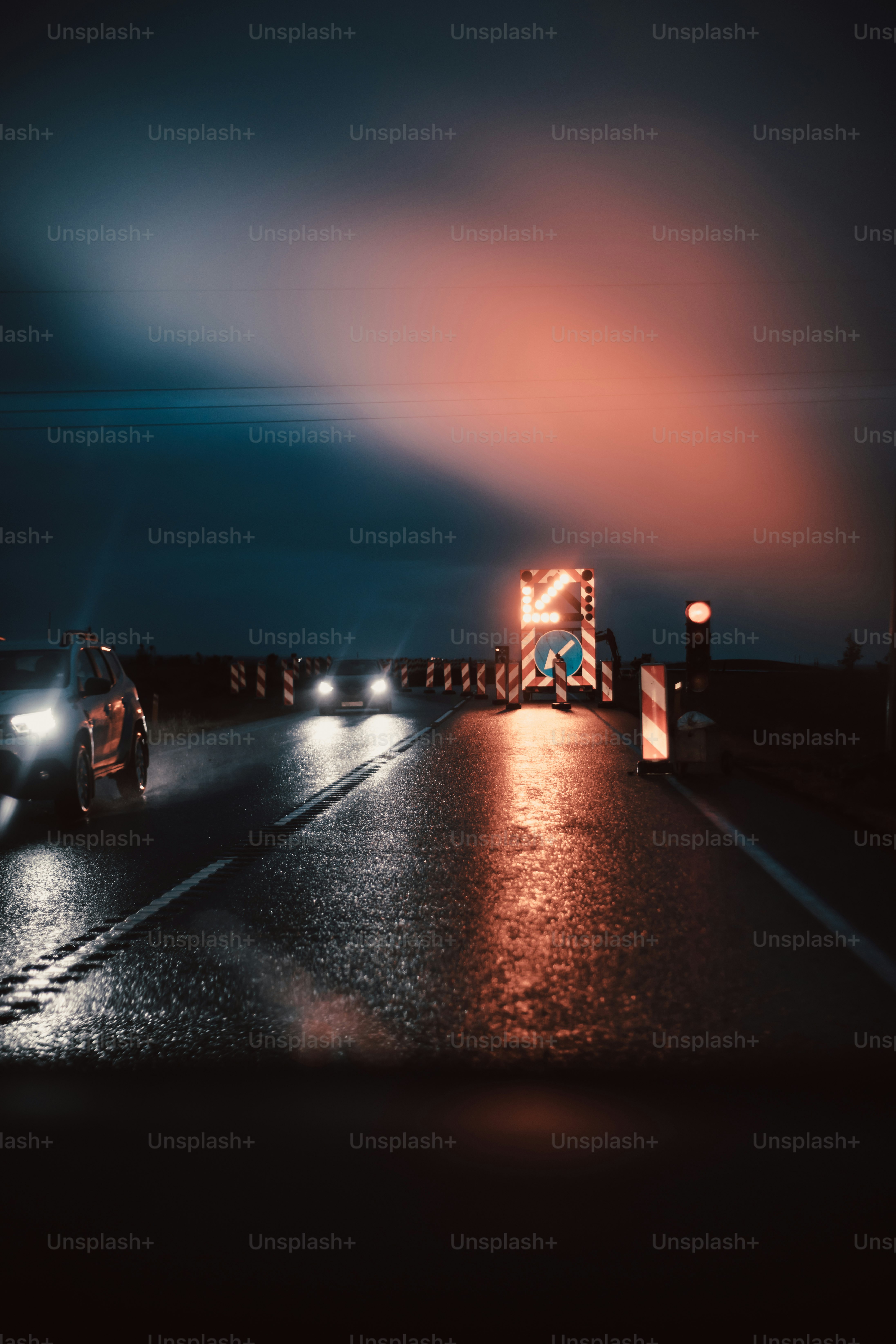 a couple of cars that are sitting in the street