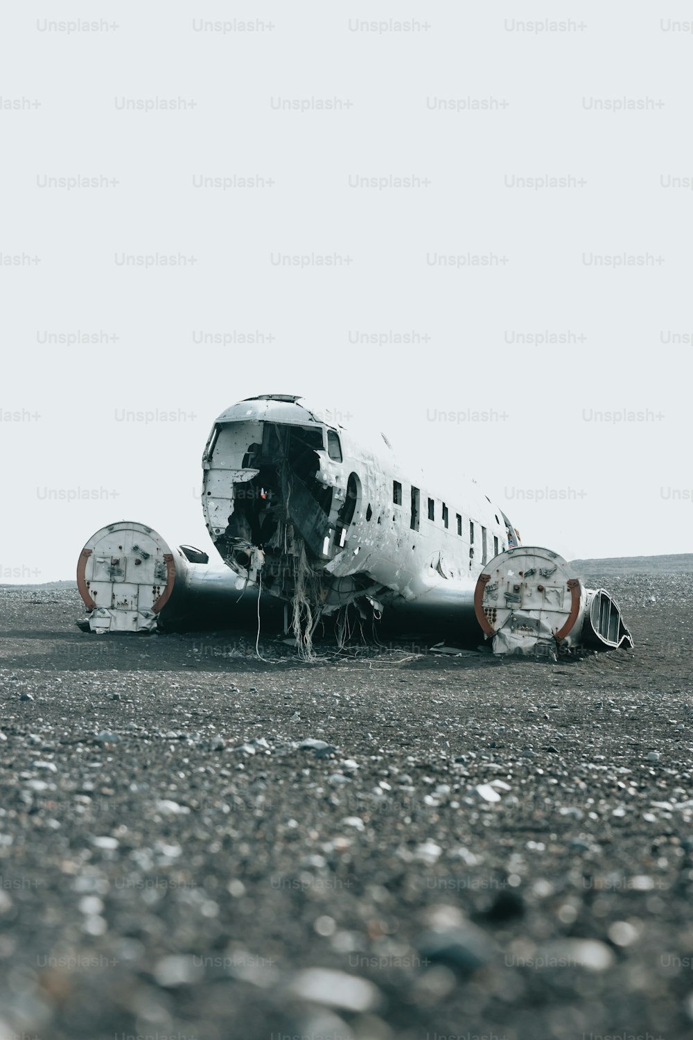 a plane that is sitting in the dirt
