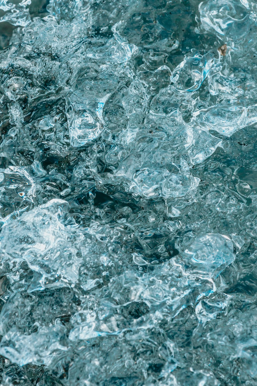 a close up of water with bubbles on it