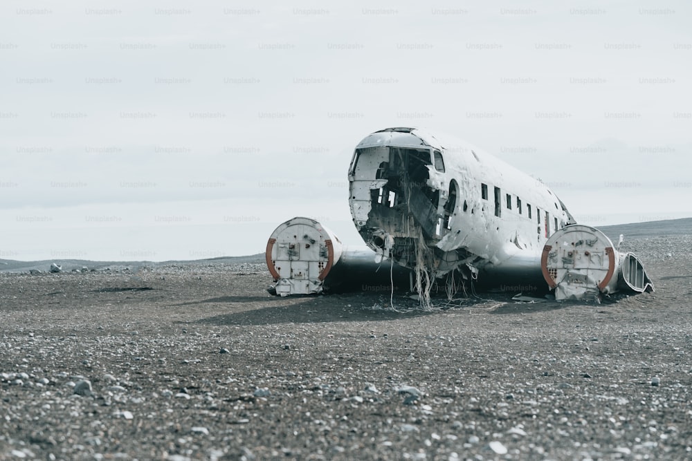 a plane that is sitting in the dirt