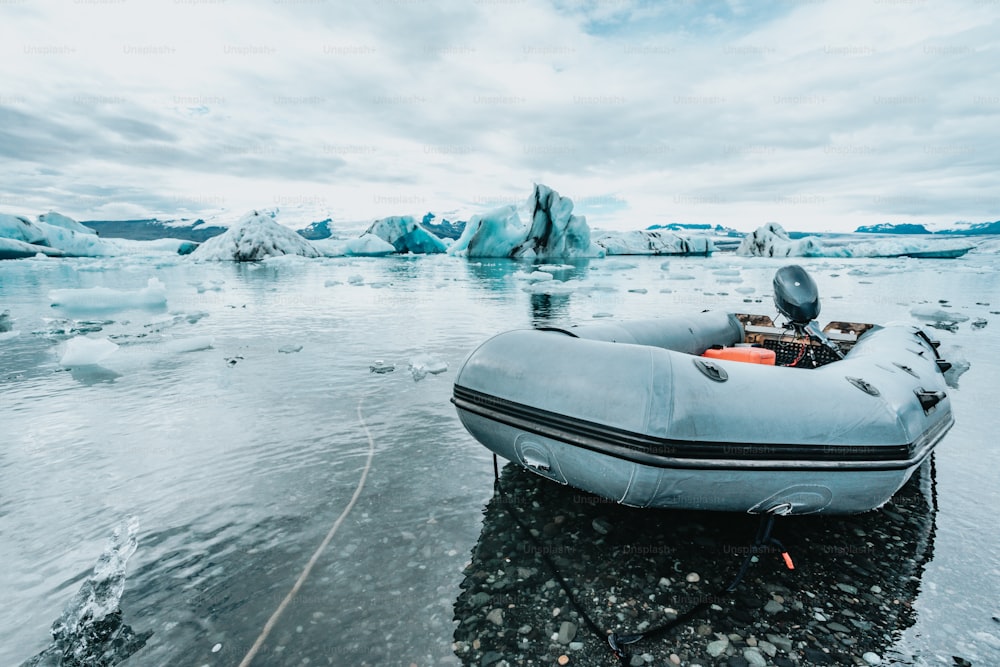 an inflatable boat floating on a body of water