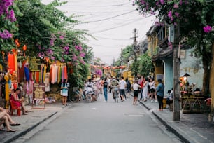 a group of people walking down a street