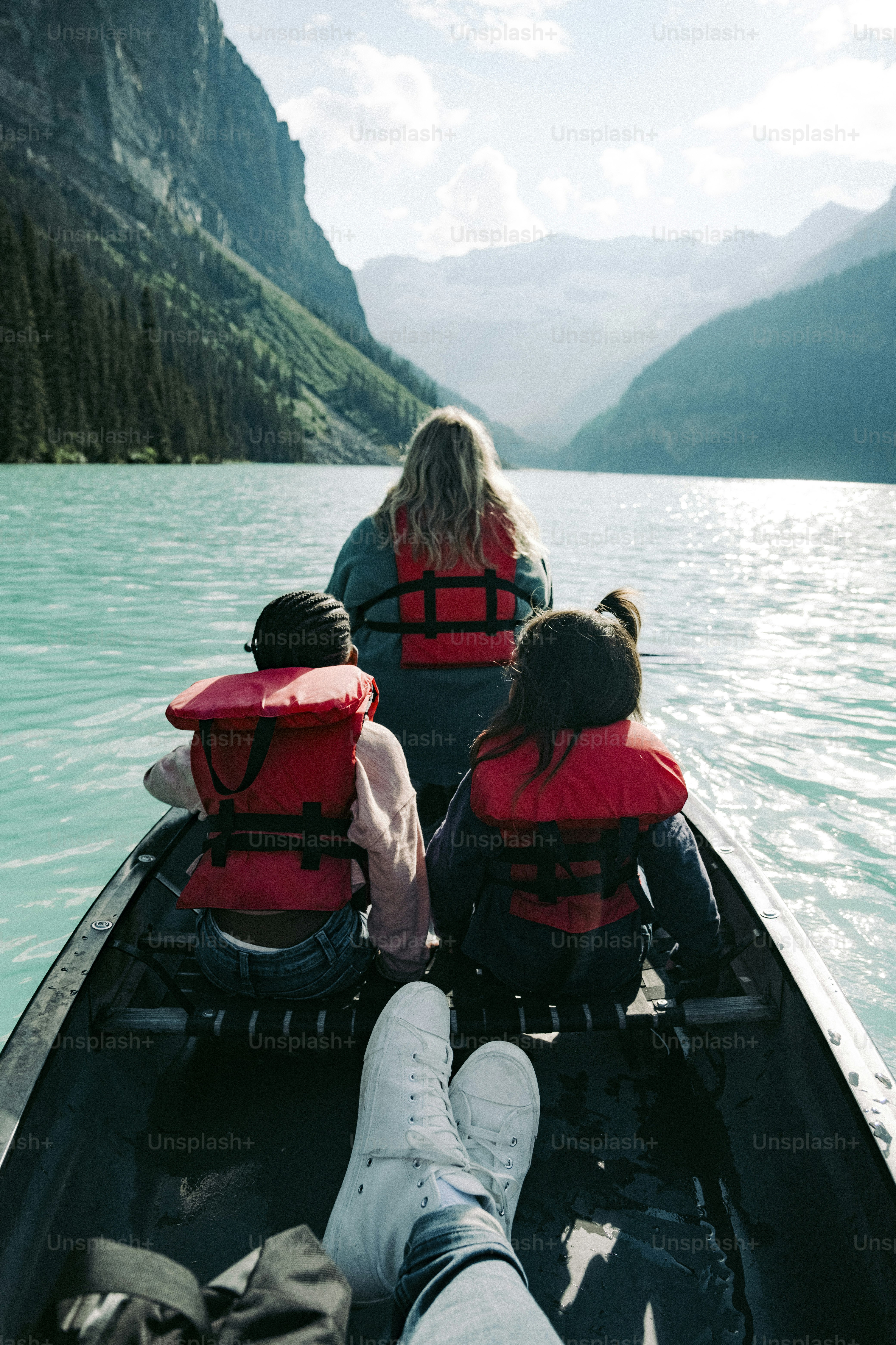 a group of people in a boat on a lake