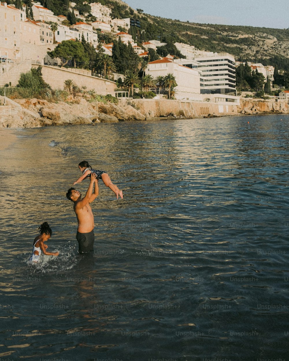 a couple of people are in the water