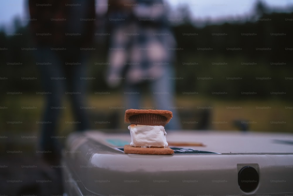 a close up of a piece of food on a suitcase