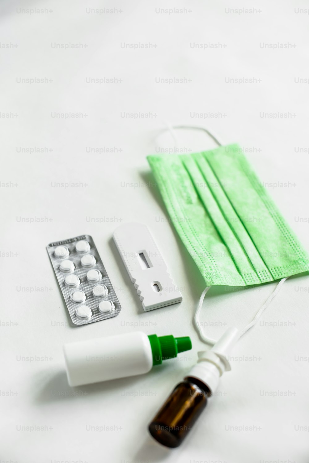 a medical device and a face mask on a table