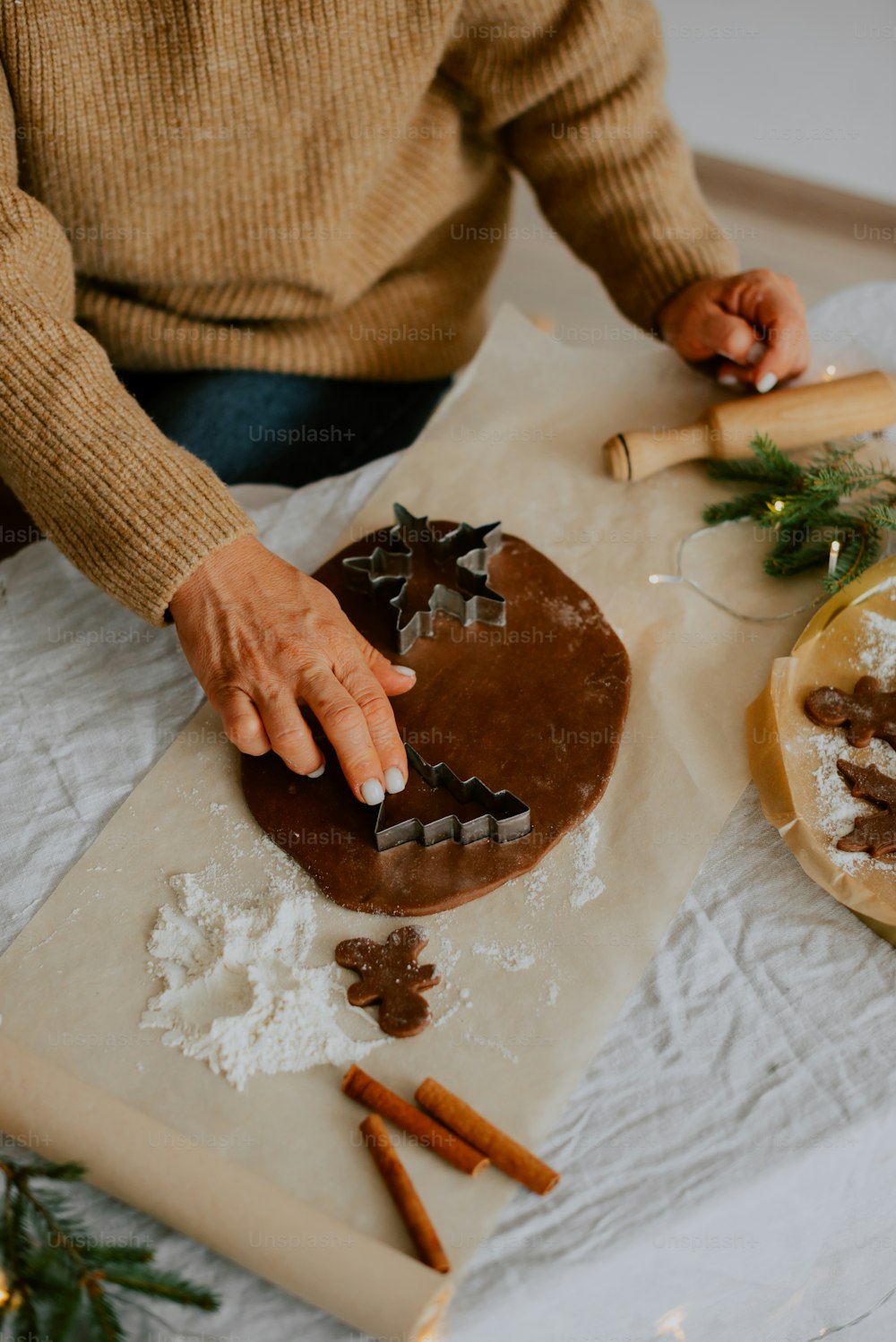 a person is decorating a cake with icing