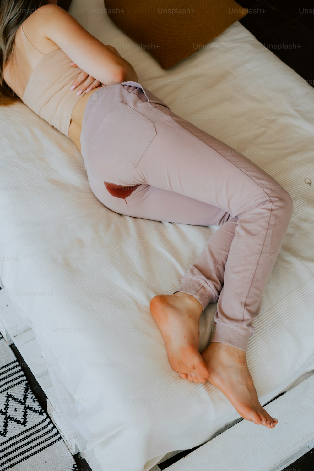 White panties in bloody stain. Beginning of the menstrual cycle. Signal of  the transition from girl to woman. Selective focus. by KYNA STUDIO. Photo  stock - StudioNow