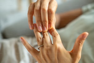 a woman holding a ring in her hands