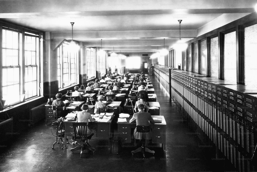 a black and white photo of a classroom