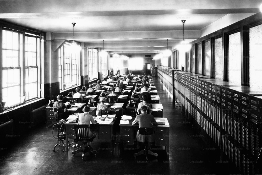a black and white photo of a classroom