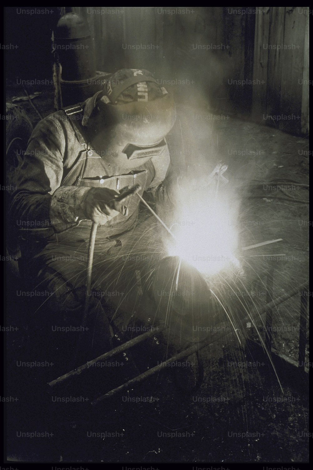 a welder working on a piece of metal