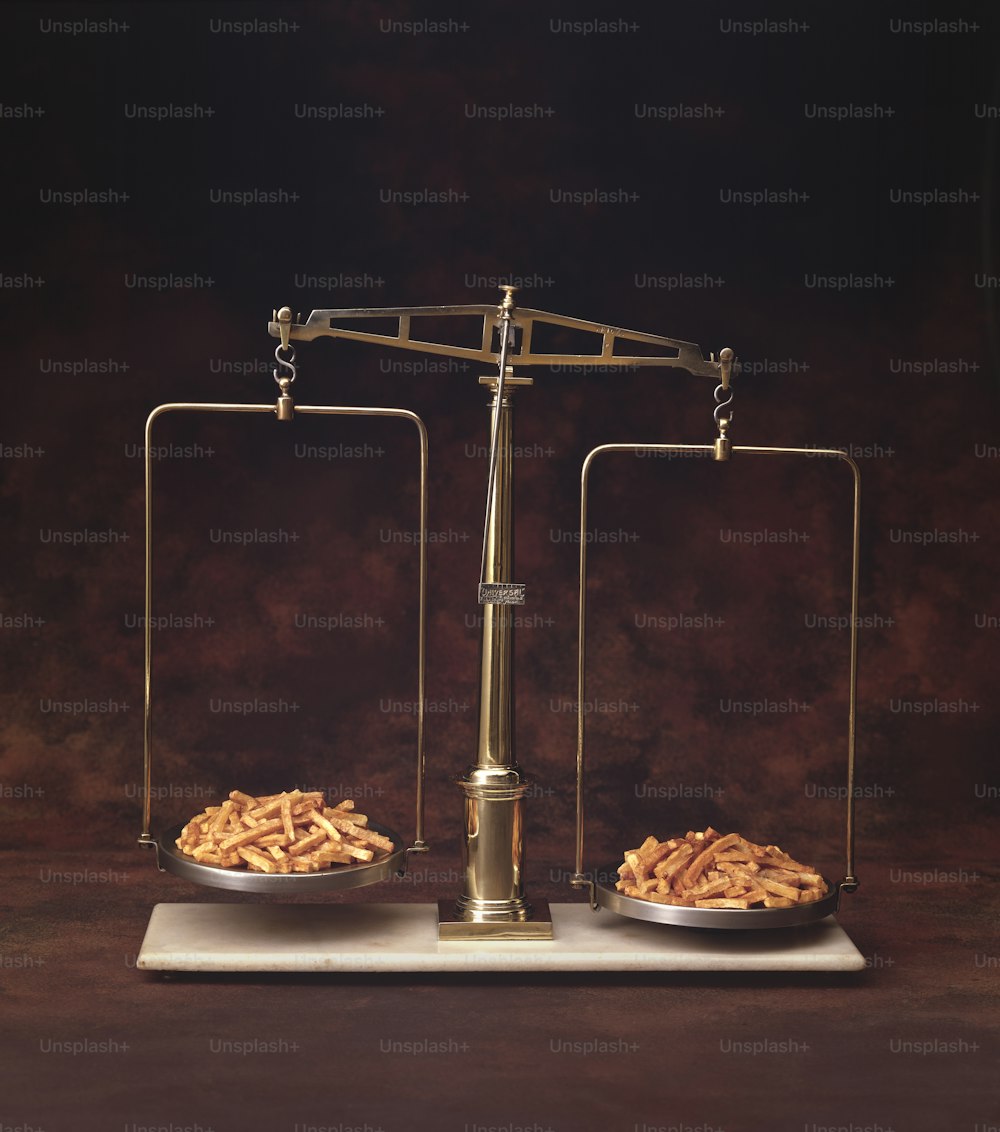 View of French fries being weighed on a brass scale, California, 1992. (Photo by Tom Kelley/Getty Images)