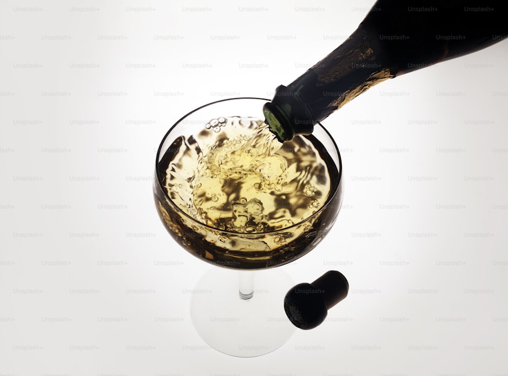 Close-up of a bottle of Almaden sparkling wine as it is poured into a glass, mid to late twentieth century. (Photo by Tom Kelley/Getty Images)