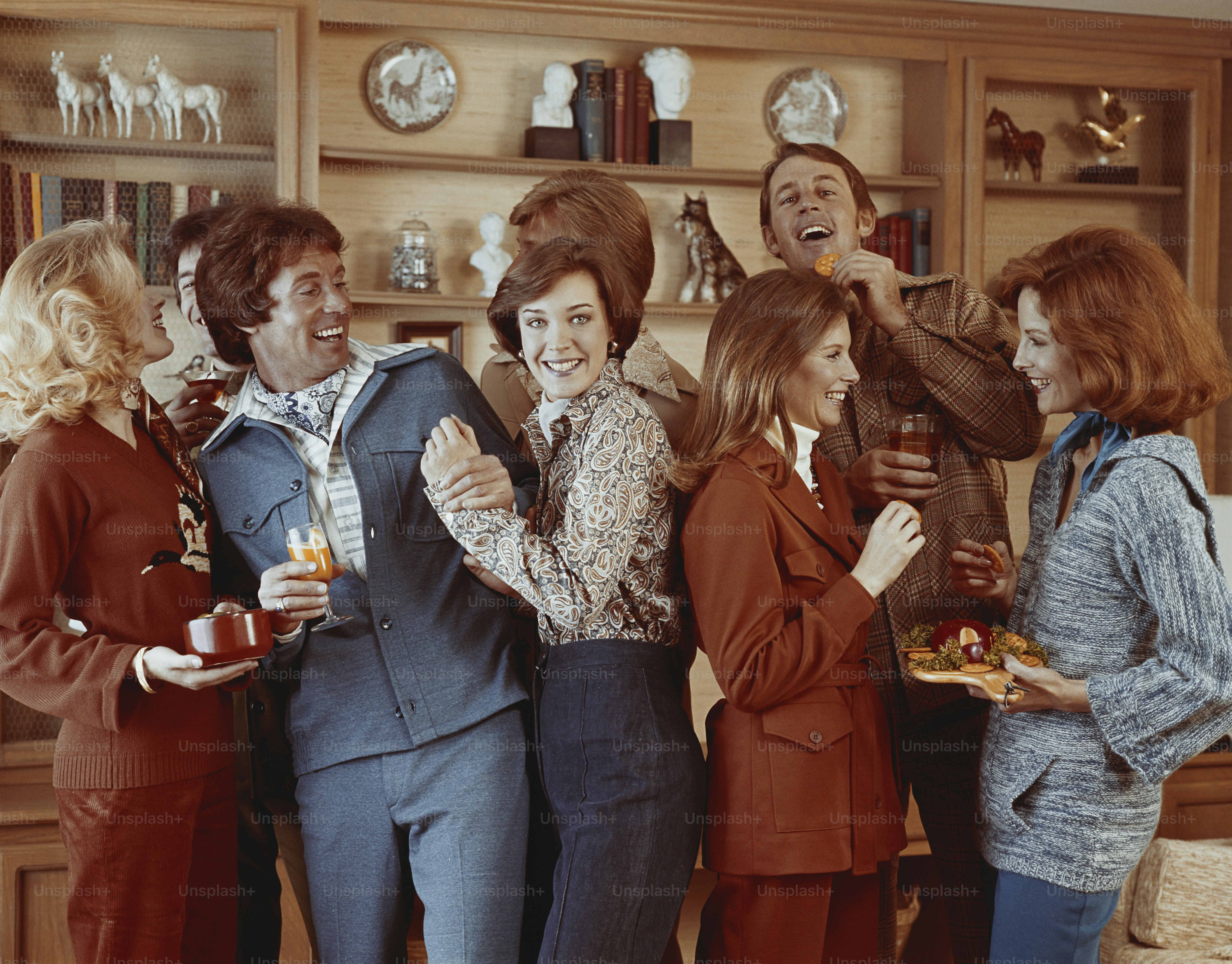 a group of people standing next to each other