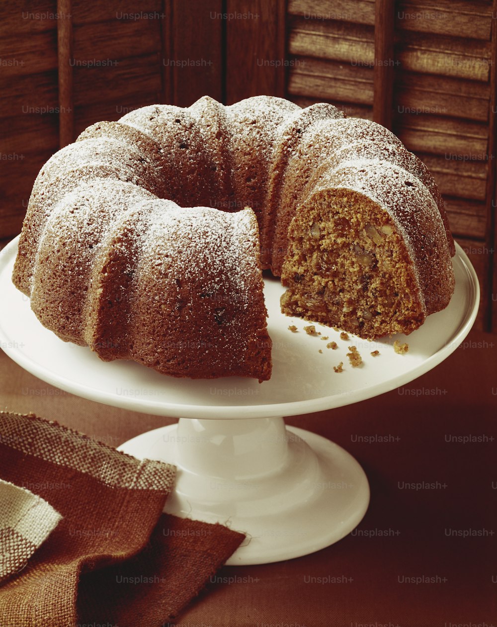 a bundt cake with a slice cut out of it