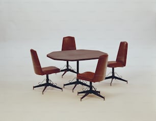 a round table with four chairs around it