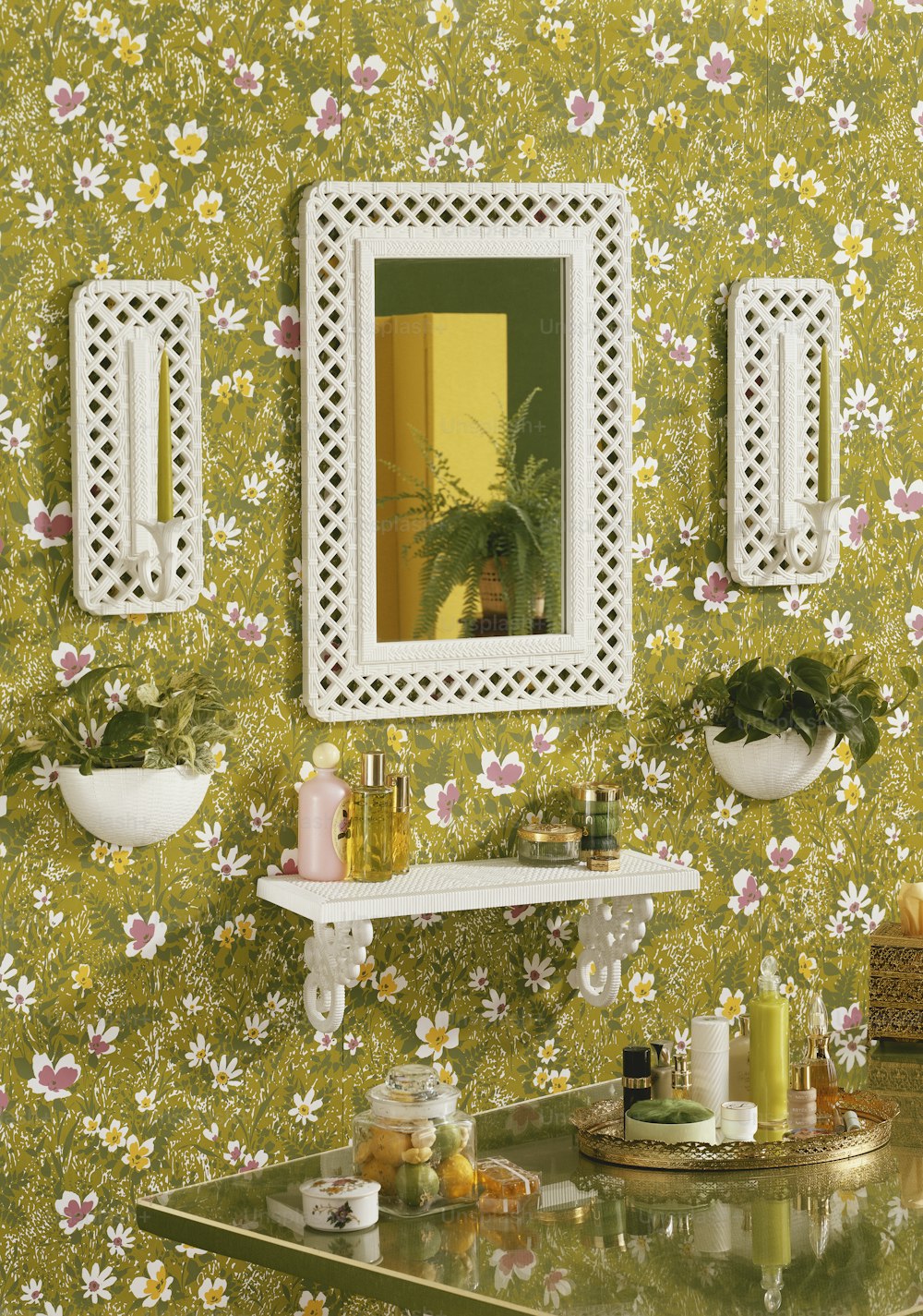 a bathroom with a sink, mirror and shelf