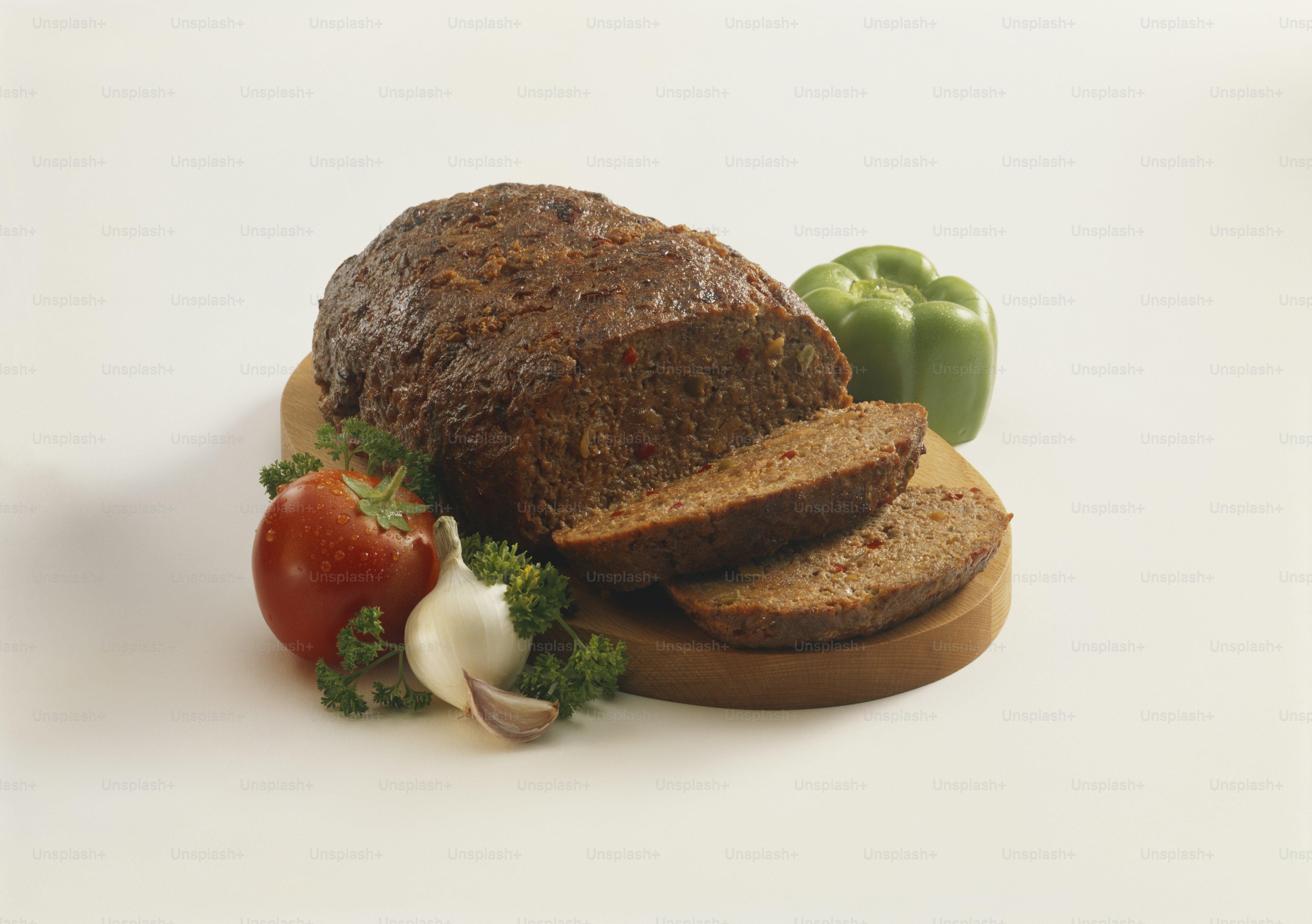 a loaf of bread sitting on top of a cutting board