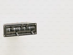 a close up of a switch box with numbers on it