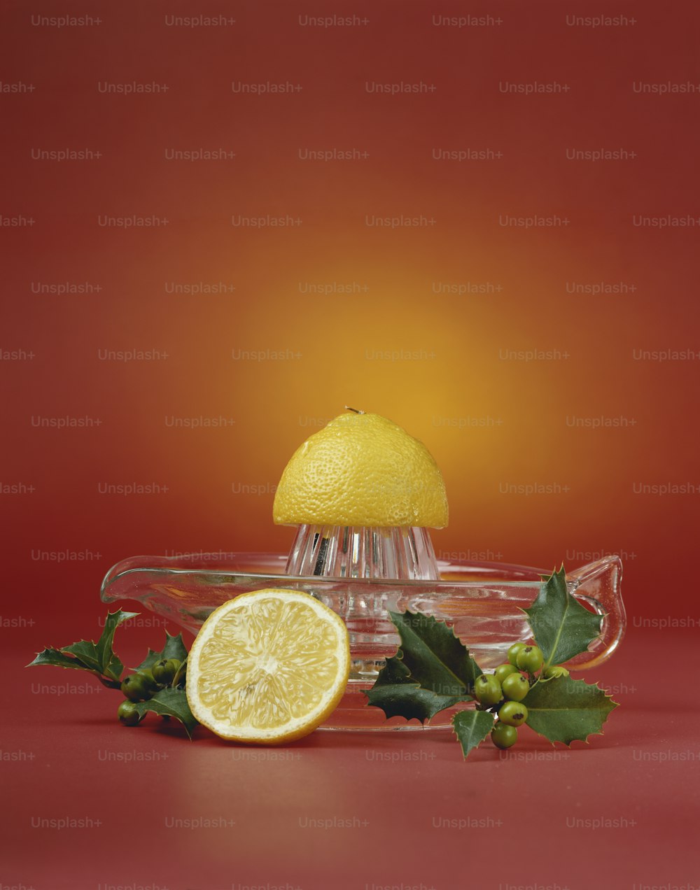 a lemon sitting on top of a glass bowl