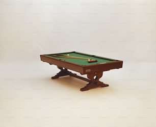 a pool table with a green cloth on it