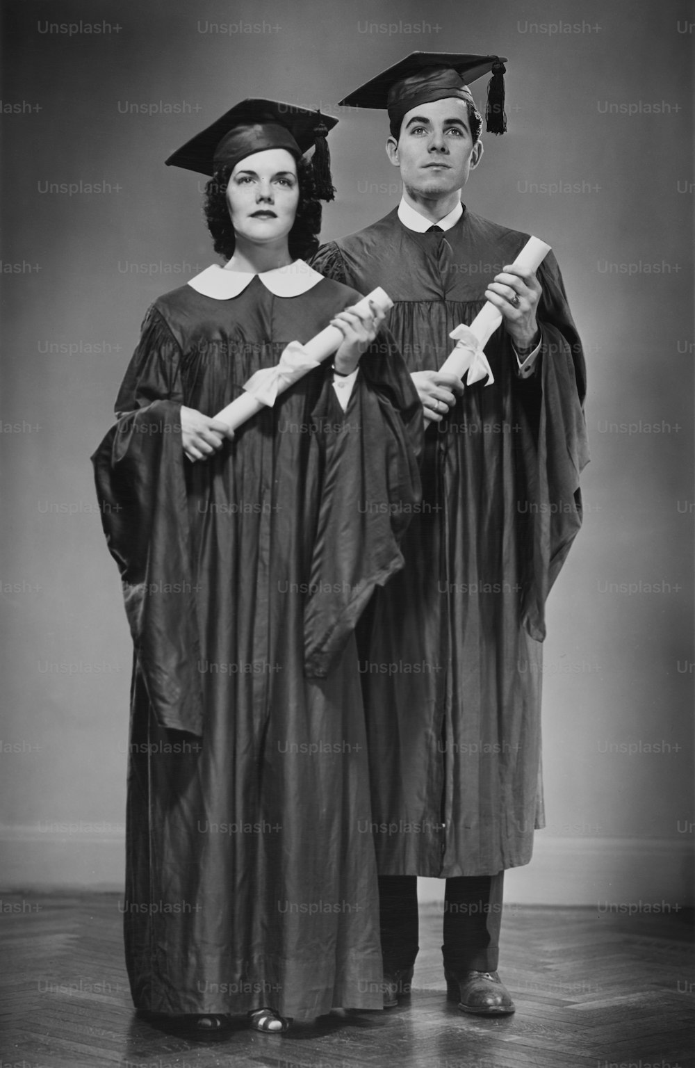 Two young graduates with their diplomas, circa 1950.  (Photo by George Marks/Retrofile/Getty Images)