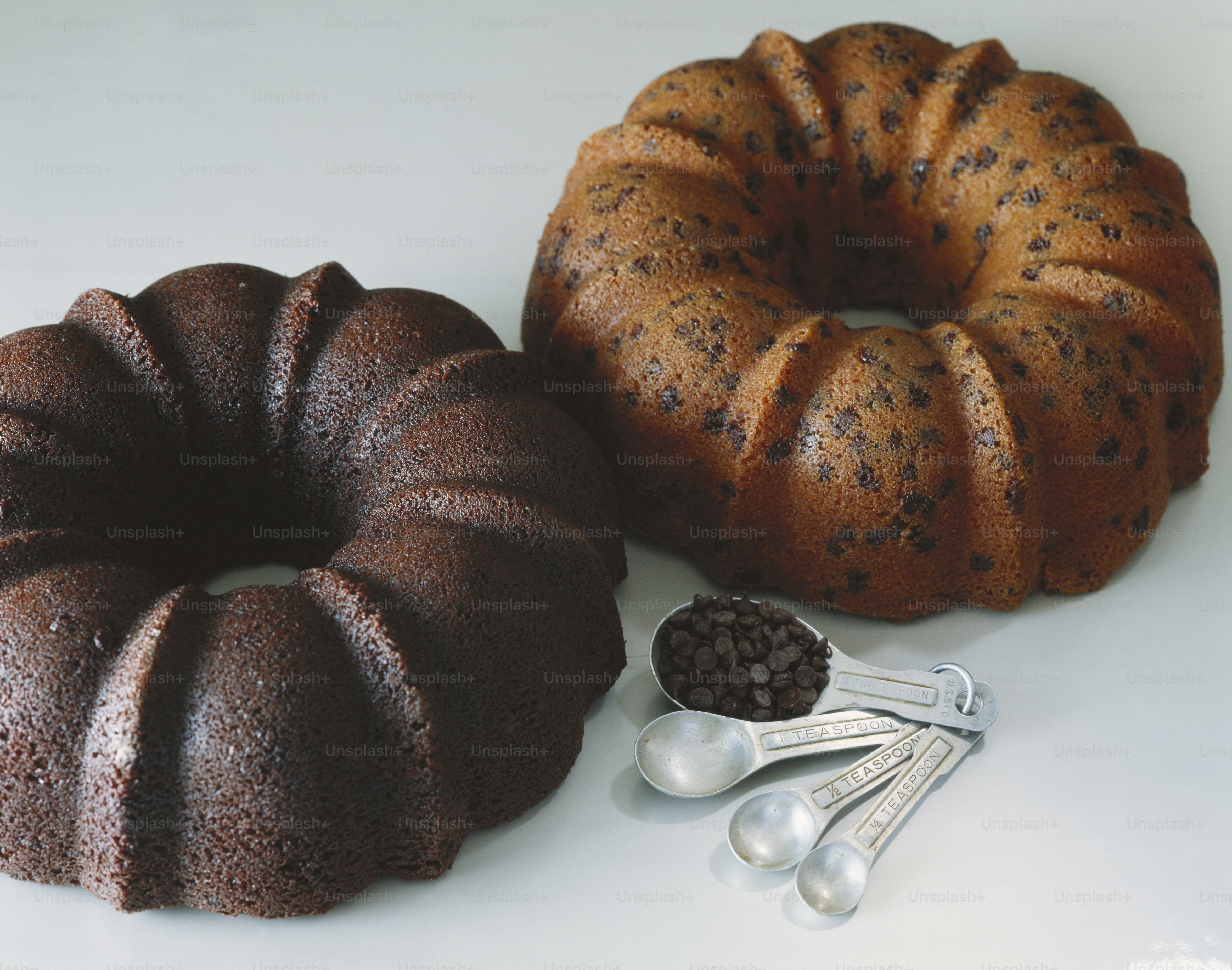a bundt cake next to a bundt cake with chocolate sprinkles
