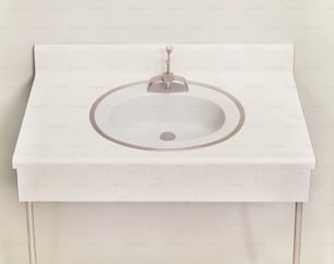 a white bathroom sink with a chrome faucet