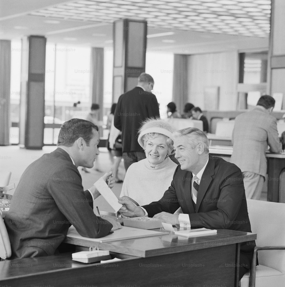 a couple of people that are sitting at a table