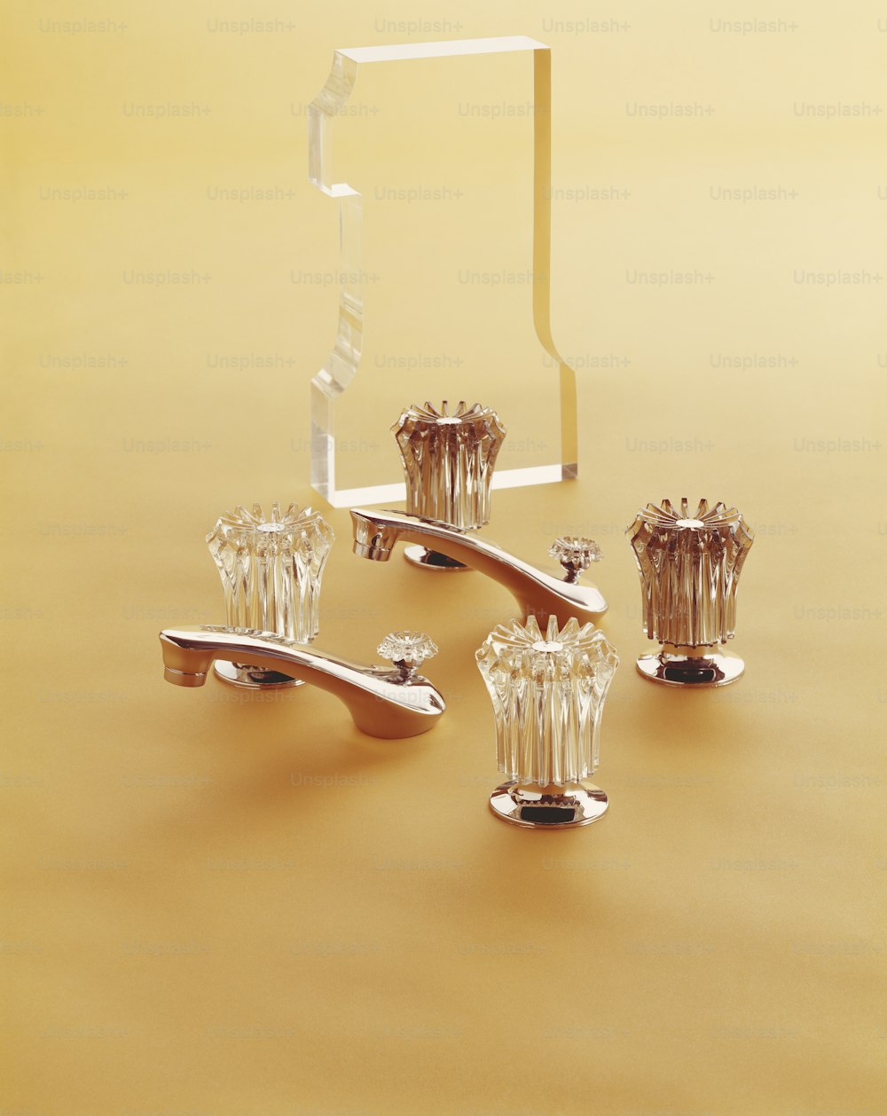 a set of four crystal candlesticks sitting on a table