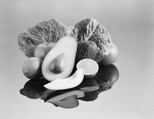 a black and white photo of fruits and vegetables