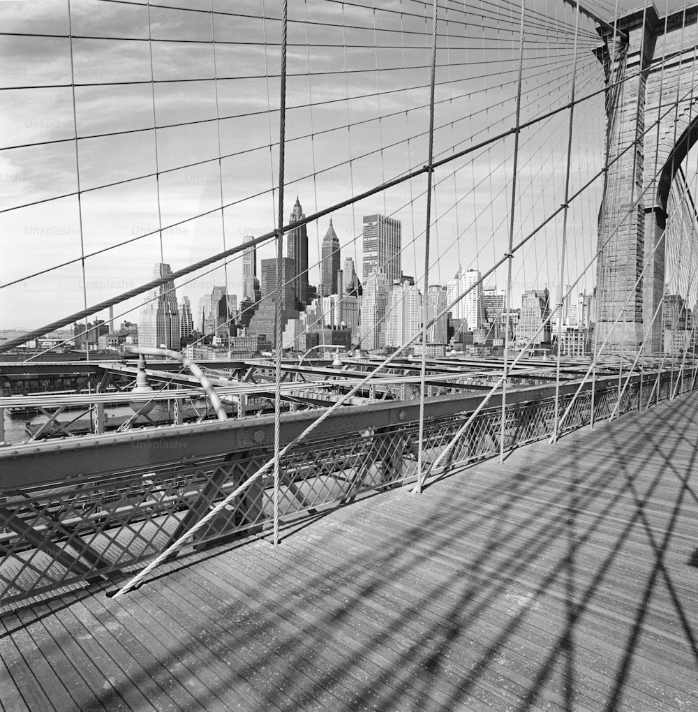 a black and white photo of the brooklyn bridge