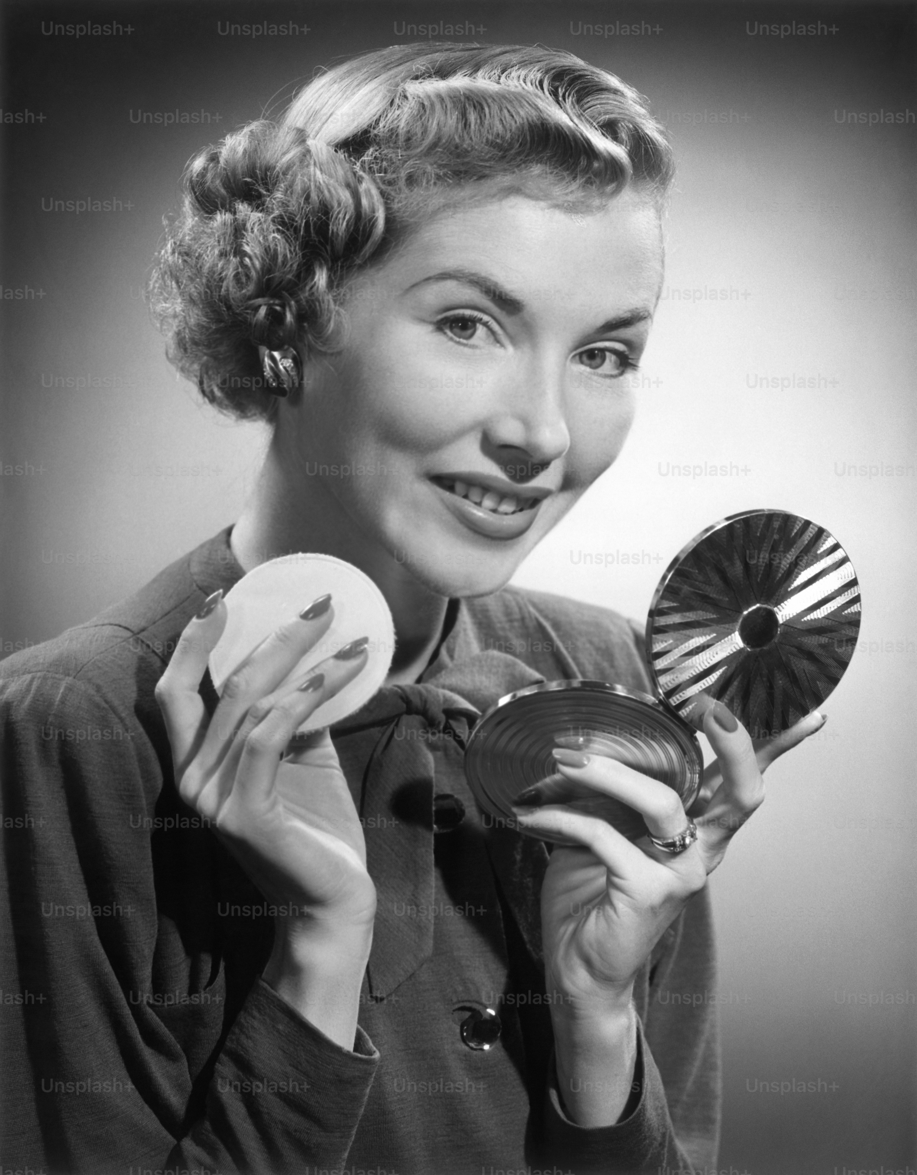 UNITED STATES - CIRCA 1950s: Woman applying make-up. photo – Human hand ...