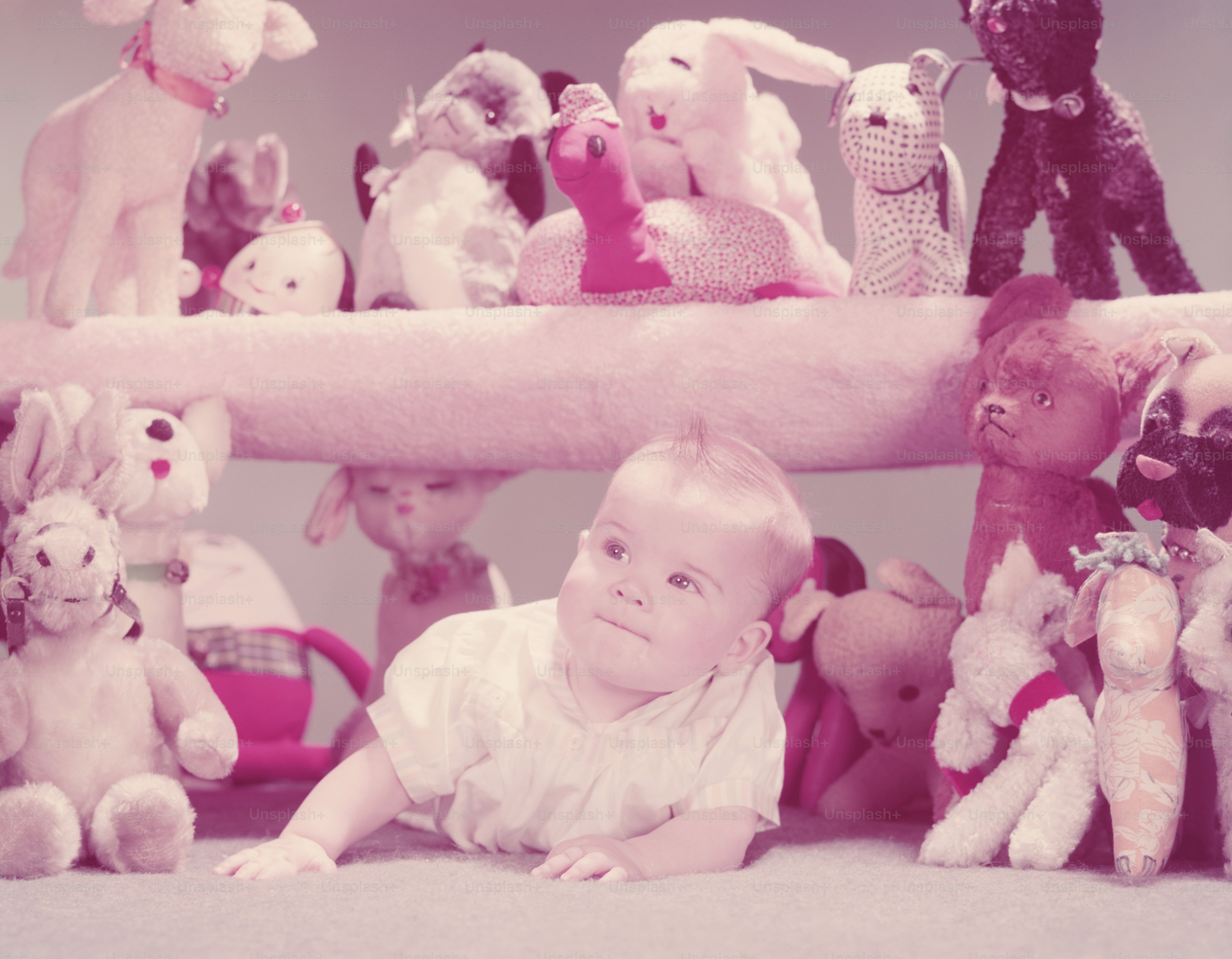 united-states-circa-1950s-baby-crawling-under-shelf-filled-with