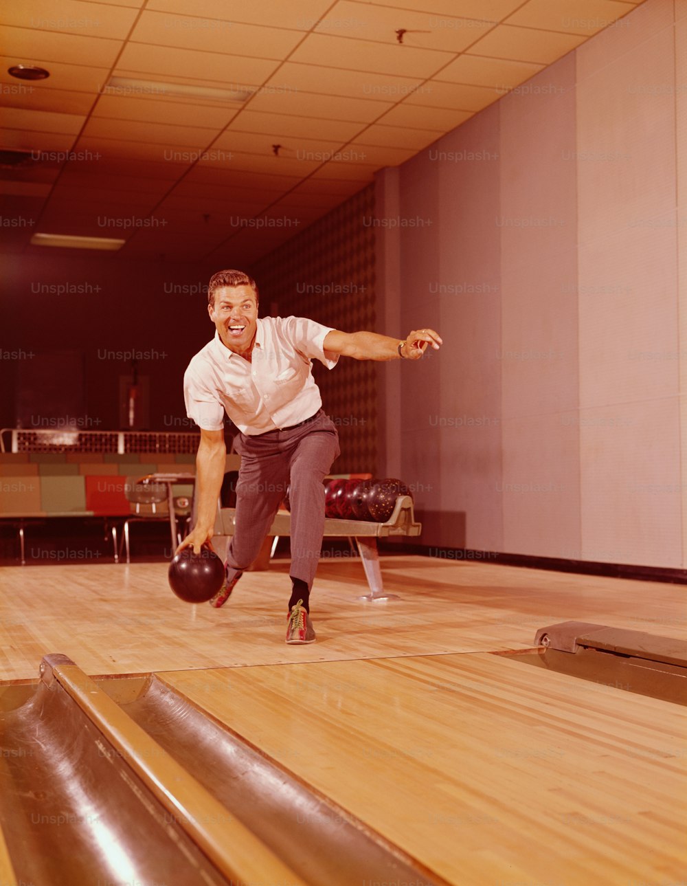 UNITED STATES - CIRCA 1960s:  Man bowling.