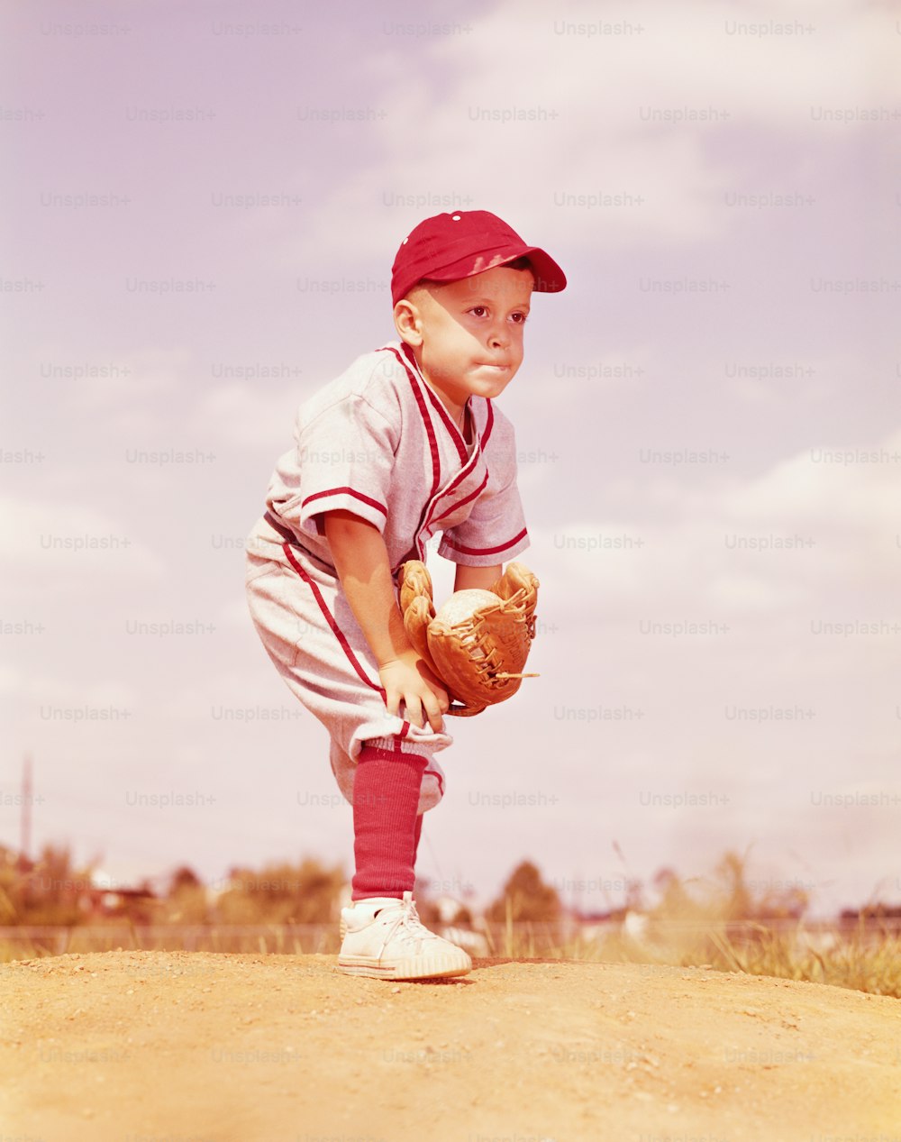 UNITED STATES - CIRCA 1950s:  Boy playing with ball.